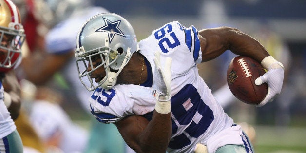 ARLINGTON, TX - SEPTEMBER 07: DeMarco Murray #29 of the Dallas Cowboys runs the ball against the San Francisco 49ers in the second quarter at AT&T Stadium on September 7, 2014 in Arlington, Texas. (Photo by Ronald Martinez/Getty Images)