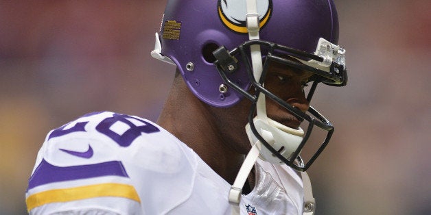 ST. LOUIS, MO - SEPTEMBER 7: Adrian Peterson #28 of the Minnesota Vikings warms up prior to a game against the St. Louis Rams at the Edward Jones Dome on September 7, 2014 in St. Louis, Missouri. (Photo by Michael B. Thomas/Getty Images)