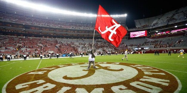 TUSCALOOSA, AL - SEPTEMBER 13: Big Al, mascot of the Alabama Crimson Tide, waves the flag after their 52-12 win over the Southern Miss Golden Eagles at Bryant-Denny Stadium on September 13, 2014 in Tuscaloosa, Alabama. (Photo by Kevin C. Cox/Getty Images)