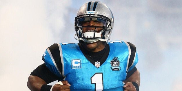 CHARLOTTE, NC - SEPTEMBER 21: Cam Newton #1 of the Carolina Panthers makes his entrance against the Pittsburgh Steelers during the game at Bank of America Stadium on September 21, 2014 in Charlotte, North Carolina. (Photo by Streeter Lecka/Getty Images)