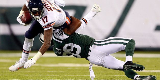 EAST RUTHERFORD, NJ - SEPTEMBER 22: Wide receiver Alshon Jeffery #17 of the Chicago Bears is tackled by free safety Antonio Allen #39 of the New York Jets during a game at MetLife Stadium on September 22, 2014 in East Rutherford, New Jersey. (Photo by Elsa/Getty Images)