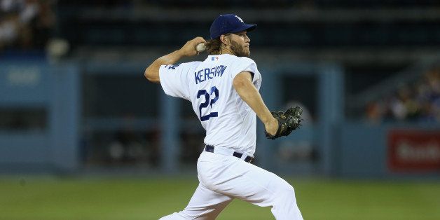 LOS ANGELES, CA - SEPTEMBER 24: Clayton Kershaw #22 of the Los Angeles Dodgers pitches against the San Francisco Giants in the first inning at Dodger Stadium on September 24, 2014 in Los Angeles, California. (Photo by Jeff Gross/Getty Images)