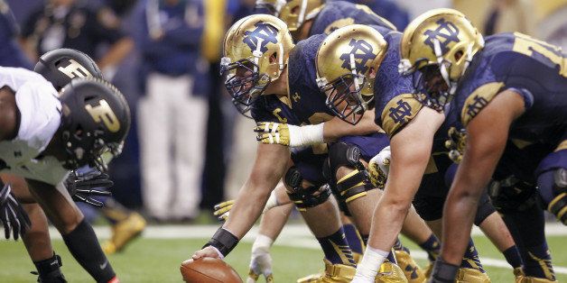 INDIANAPOLIS, IN - SEPTEMBER 13: Members of the Notre Dame Fighting Irish offensive line line up against the Purdue Boilermakers at Lucas Oil Stadium on September 13, 2014 in Indianapolis, Indiana. (Photo by Michael Hickey/Getty Images)