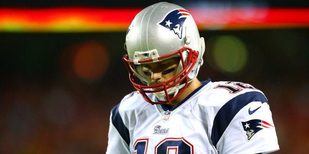 KANSAS CITY, MO - SEPTEMBER 29: Tom Brady #12 of the New England Patriots on the sidelines during the game against the Kansas City Chiefs at Arrowhead Stadium on September 29, 2014 in Kansas City, Missouri. (Photo by Dilip Vishwanat/Getty Images)