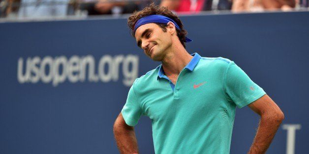 Roger Federer of Switzerland reacts to shot against Marin Cilic of Croatia during their 2014 US Open men's semifinal singles match at the USTA Billie Jean King National Tennis Center September 6, 2014 in New York. AFP PHOTO/Stan HONDA (Photo credit should read STAN HONDA/AFP/Getty Images)