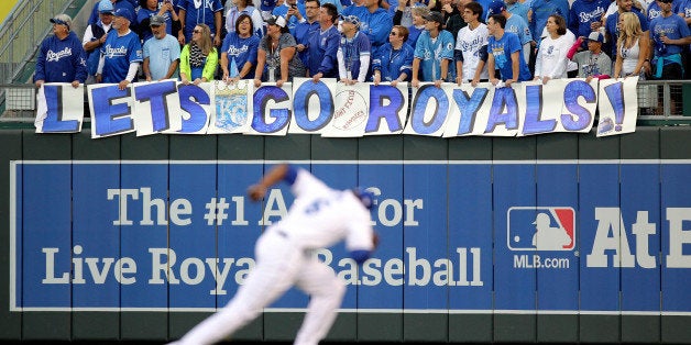 KANSAS CITY, MO - OCTOBER 05: Kansas City Royals fans hold up a sign during Game Three of the American League Division Series against the Los Angeles Angels at Kauffman Stadium on October 5, 2014 in Kansas City, Missouri. (Photo by Ed Zurga/Getty Images)