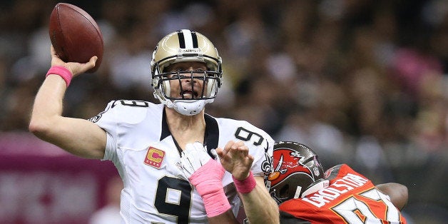 NEW ORLEANS, LA - OCTOBER 05: Drew Brees #9 of the New Orleans Saints throws a pass against the Tampa Bay Buccaneers at the Mercedes-Benz Superdome on October 5, 2014 in New Orleans, Louisiana. (Photo by Chris Graythen/Getty Images)