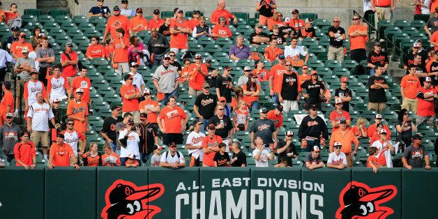 BALTIMORE, MD - OCTOBER 02: Fans gather in the stands prior to Game One of the American League Division Series at Oriole Park at Camden Yards on October 2, 2014 in Baltimore, Maryland. (Photo by Rob Carr/Getty Images)