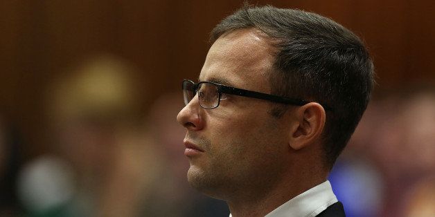 BY COURT ORDER, THIS IMAGE IS FREE TO USE. PRETORIA, SOUTH AFRICA - OCTOBER 16 (SOUTH AFRICA OUT): Oscar Pistorius during his sentencing hearing in the Pretoria High Court for sentencing in his murder trial on October 16, 2014, in Pretoria, South Africa. Judge Thokozile Masipa found Pistorius not guilty of murdering his girlfriend Reeva Steenkamp, but convicted him of culpable homicide. Sentencing continues today. (Photo by Alon Skuy/The Times/Gallo Images/Getty Images)