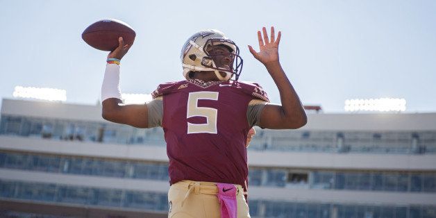 TALLAHASSEE, FL - OCTOBER 4: Quarterback Jameis Winston #5 of the Florida State Seminoles warms up prior to the game against the Wake Forest Demon Deacons at Doak Campbell Stadium on October 4, 2014 in Tallahassee, Florida. (Photo by Jeff Gammons/Getty Images)