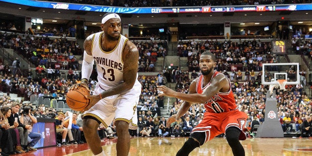 COLUMBUS, OH - OCTOBER 20: LeBron James #23 of the Cleveland Cavaliers controls the ball against the Chicago Bulls at the Je