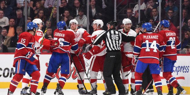 MONTREAL, QC - OCTOBER 21: P.K. Subban #76 of the Montreal Canadiens argues with Joakim Andersson #18 of the Detroit Red Wings while teammates try to hold him back in the NHL game at the Bell Centre on October 21, 2014 in Montreal, Quebec, Canada. (Photo by Francois Lacasse/NHLI via Getty Images)
