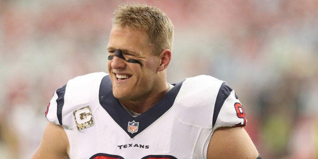 GLENDALE, AZ - NOVEMBER 10: Defensive end J.J. Watt #99 of the Houston Texans laughs during warmups for the game with the Ar