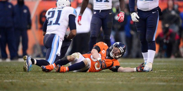 DENVER, CO - DECEMBER 08: Denver Broncos wide receiver Wes Welker (83) after getting a concussion on a hard hit in the second quarter. The Denver Broncos take on the Tennessee Titans at Sports Authority Field at Mile High in Denver on December 8, 2013. (Photo by AAron Ontiveroz/The Denver Post via Getty Images)