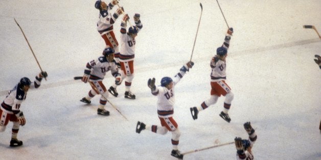 LAKE PLACID, NY - FEBRUARY 22: United States Olympic Hockey players jump with jubilation after beating the Soviet Union hock