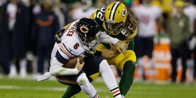 GREEN BAY, WI - NOVEMBER 9: Quarterback Jay Cutler #6 of the Chicago Bears is sacked by Clay Matthews #52 of the Green Bay Packers in the second quarter during the NFL game at Lambeau Field on November 09, 2014 in Green Bay, Wisconsin. (Photo Tom Lynn /Getty Images)