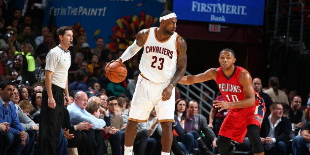 CLEVELAND, OH - NOVEMBER 10: LeBron James #23 of the Cleveland Cavaliers handles the ball against the New Orleans Pelicans on November 10, 2014 at Quicken Loans Arena in Cleveland. Ohio. NOTE TO USER: User expressly acknowledges and agrees that, by downloading and or using this Photograph, user is consenting to the terms and conditions of the Getty Images License Agreement. Mandatory Copyright Notice: Copyright 2014 NBAE (Photo by Nathaniel S. Butler/NBAE via Getty Images)