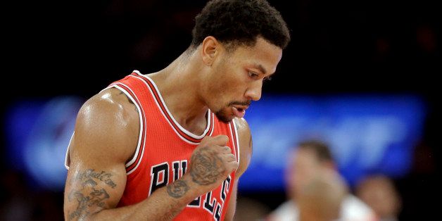Chicago Bulls' Derrick Rose (1) reacts to a play during the second half of an NBA basketball game against the New York Knicks, Wednesday, Oct. 29, 2014, in New York. (AP Photo/Frank Franklin II)