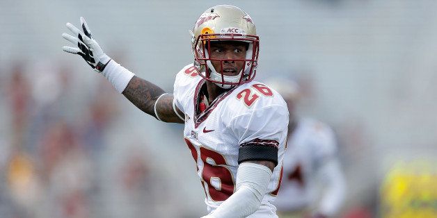 TALLAHASSEE, FL - APRIL 12: P.J. Williams #26 of the Gold team reacts to a recovered fumble against the Garnet team during Florida State's Garnet and Gold spring game at Doak Campbell Stadium on April 12, 2014 in Tallahassee, Florida. (Photo by Stacy Revere/Getty Images)