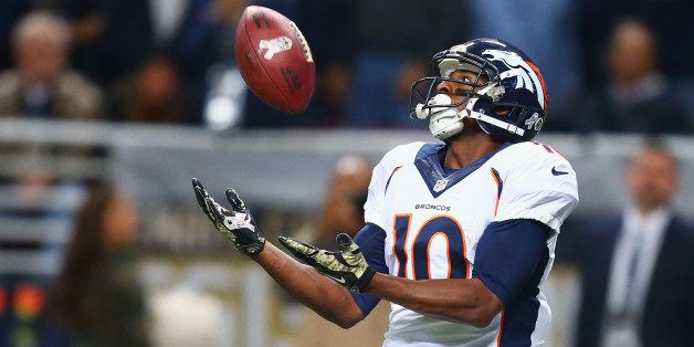 ST. LOUIS, MO - NOVEMBER 16: Emmanuel Sanders #10 of the Denver Broncos catches a 42-yard touchdown pass against the St. Louis Rams in the second quarter t the Edward Jones Dome on November 16, 2014 in St. Louis, Missouri. (Photo by Dilip Vishwanat/Getty Images)