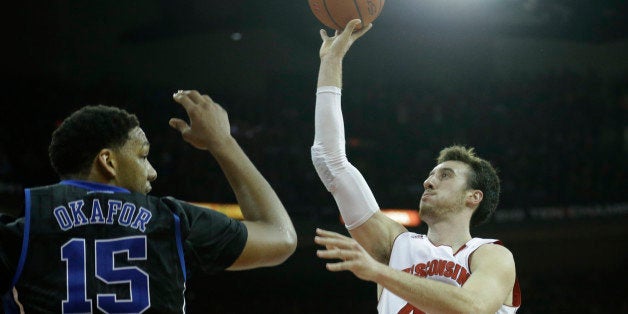 MADISON, WI - DECEMBER 03: Frank Kaminsky #44 of the Wisconsin Badgers drives to the hoop during the second half of play agai