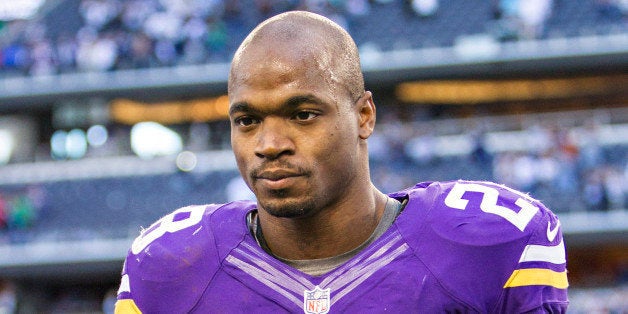 ARLINGTON, TX - NOVEMBER 3: Adrian Peterson #28 of the Minnesota Vikings walks off the field after a game against the Dallas Cowboys at AT&T Stadium on November 3, 2013 in Arlington, Texas. The Cowboys defeated the Vikings 27-23. (Photo by Wesley Hitt/Getty Images)