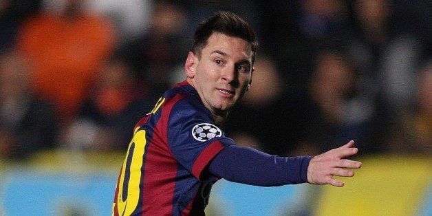 Barcelona's Argentinian forward Lionel Messi celebrates scoring a goal during their UEFA Champions League football match against Apeol at the Neo GSP Stadium in the Cypriot capital, Nicosia, on November 25, 2014.AFP PHOTO/ SAKIS SAVVIDES (Photo credit should read SAKIS SAVVIDES/AFP/Getty Images)