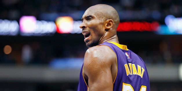 DALLAS, TX - NOVEMBER 21: Kobe Bryant #24 of the Los Angeles Lakers reacts to a call against the Dallas Mavericks in the third quarter at American Airlines Center on November 21, 2014 in Dallas, Texas. NOTE TO USER: User expressly acknowledges and agrees that, by downloading and or using this photograph, User is consenting to the terms and conditions of the Getty Images License Agreement. (Photo by Tom Pennington/Getty Images)