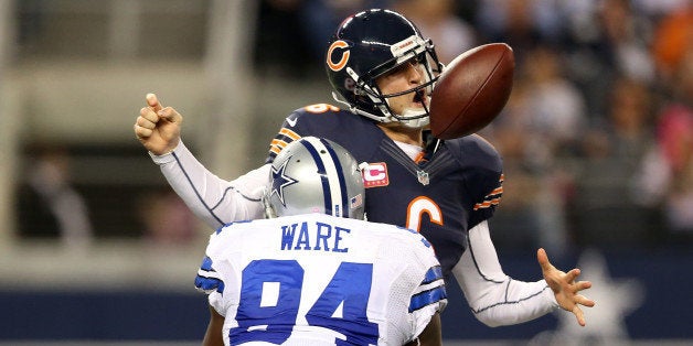 ARLINGTON, TX - OCTOBER 01: Jay Cutler #6 of the Chicago Bears fumbles the ball as he is sacked by DeMarcus Ware #94 of the Dallas Cowboys in the third quarter at Cowboys Stadium on October 1, 2012 in Arlington, Texas. (Photo by Ronald Martinez/Getty Images)