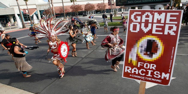 A group protests the Washington Redskins name across from Levi's Stadium before an NFL football game...
