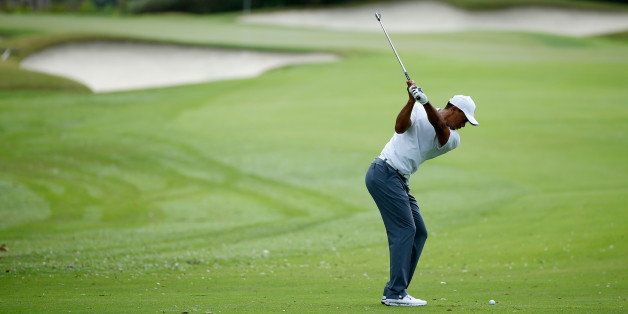 WINDERMERE, FL - DECEMBER 03: Tiger Woods hits a shot during the pro-am prior to the start of the Hero World Challenge at the Isleworth Golf & Country Club on December 3, 2014 in Windermere, Florida. (Photo by Scott Halleran/Getty Images)