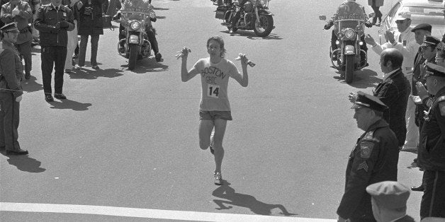 Bill Rodgers of the Greater Boston Track Club approaches the finish line with his shadow at the line, to win the 79th annual