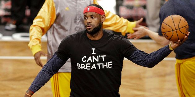 Cleveland Cavaliers' LeBron James warms up before an NBA basketball game against the Brooklyn Nets at the Barclays Center, Monday, Dec. 8, 2014, in New York. Professional athletes have worn "I Can't Breathe" messages in protest of a grand jury ruling not to indict an officer in the death of a New York man. (AP Photo/Frank Franklin II)