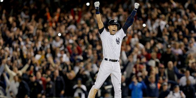New York Yankees shortstop Derek Jeter (2) reacts after hitting the game-winning hit against the Baltimore Orioles in the ninth inning of a baseball game, Thursday, Sept. 25, 2014, in New York. (AP Photo/Julie Jacobson)