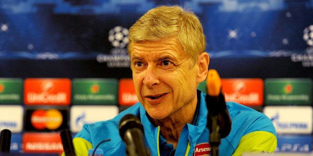 ISTANBUL, TURKEY - DECEMBER 08: Arsenal manager Arsene Wenger attends a press conference at the ISG Airport Hotel, Sabiha Gocken International Airport on December 8, 2014 in Istanbul, Turkey. (Photo by Stuart MacFarlane/Arsenal FC via Getty Images)
