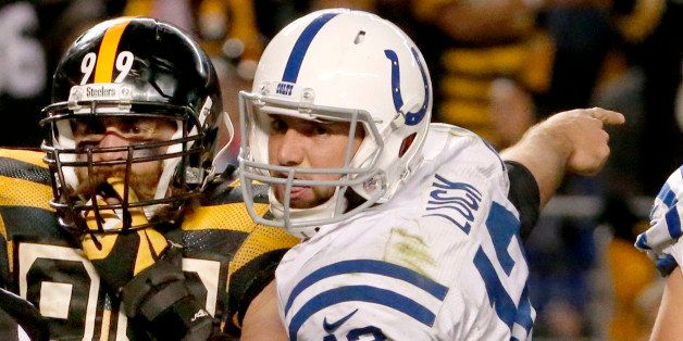 Indianapolis Colts quarterback Andrew Luck (12) argues a safety call as Pittsburgh Steelers defensive end Brett Keisel (99) listens in the fourth quarter of the NFL football game, Sunday, Oct. 26, 2014, in Pittsburgh. (AP Photo/Gene J. Puskar)