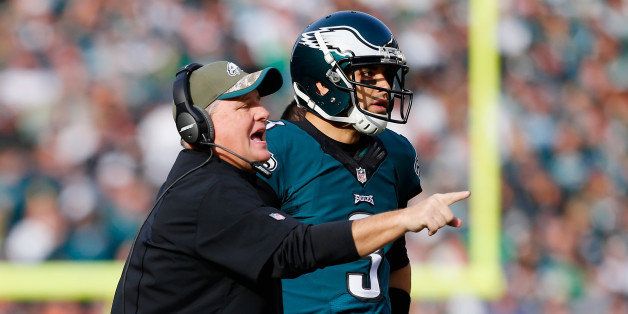 PHILADELPHIA, PA - NOVEMBER 23: Quarterback Mark Sanchez #3 of the Philadelphia Eagles stands alongside head coach Chip Kelly in the first half of the game against the Tennessee Titans at Lincoln Financial Field on November 23, 2014 in Philadelphia, Pennsylvania. (Photo by Rich Schultz/Getty Images)