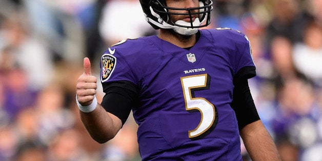 BALTIMORE, MD - NOVEMBER 09: Quarterback Joe Flacco #5 of the Baltimore Ravens signals during the second half of a game against the Tennessee Titans at M&T Bank Stadium on November 9, 2014 in Baltimore, Maryland. (Photo by Patrick Smith/Getty Images)