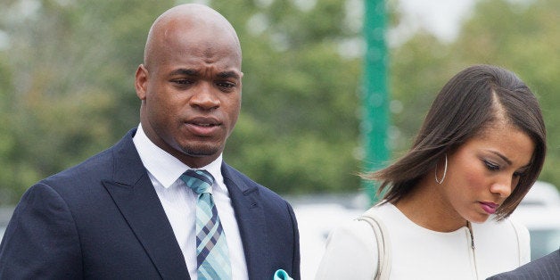 CONROE, TX - NOVEMBER 04: Football running back Adrian Peterson of the Minnesota Vikings arrives for a court hearing on charges of child abuse at the Montgomery County Courthouse on November 4, 2014 in Conroe, Texas. Peterson entered a no contest plea and will avoid jail time. (Photo by Bob Levey/Getty Images)