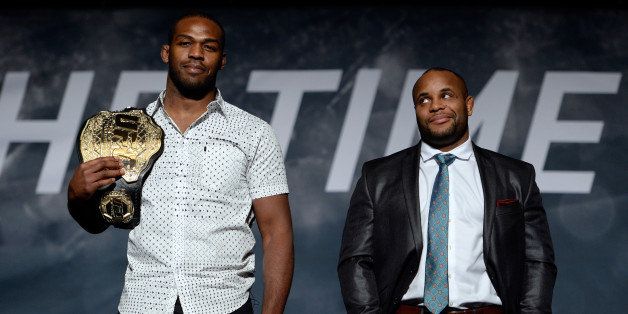LAS VEGAS, NEVADA - NOVEMBER 17: UFC light heavyweight champion Jon Jones (L) and challenger Daniel Cormier pose for the media during the UFC Time Is Now press conference at The Smith Center for the Performing Arts on November 17, 2014 in Las Vegas, Nevada. (Photo by Jeff Bottari/Zuffa LLC/Zuffa LLC via Getty Images)