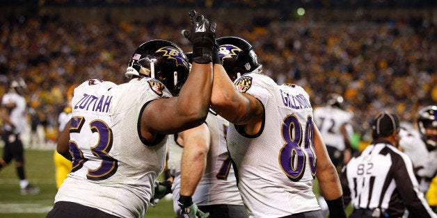 PITTSBURGH, PA - JANUARY 03: Crockett Gillmore #80 celebrates a fourth quarter touchdown with Jeremy Zuttah #53 of the Balti