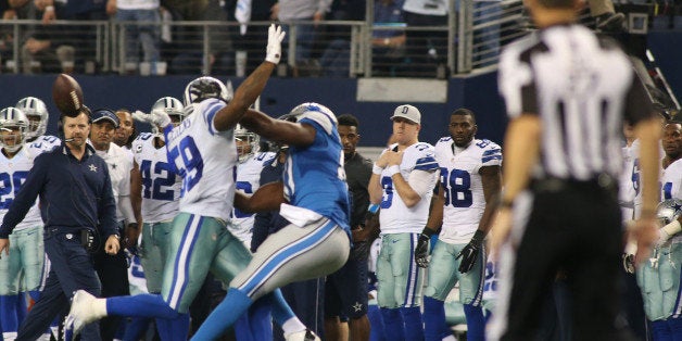Dallas Cowboys outside linebacker Anthony Hitchens (59) gets hit in the back by a pass to Detroit Lions tight end Brandon Pet