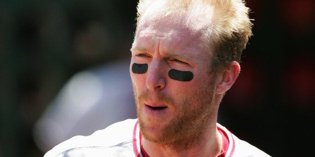 OAKLAND, CA - AUG 11: Darin Erstad #17 of the Los Angeles Angels of Anaheim looks on from the dugout during an MLB game against the Oakland Athletics at McAfee Coliseum on August 11, 2005 in Oakland, California. The Athletics won 5-4. (Photo by Jed Jacobsohn/Getty Images)