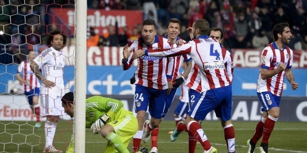 Uruguayan defender Jose Gimenez (24) celebrates after scoring during the Spanish Copa del Rey (King's Cup) round of 16 first