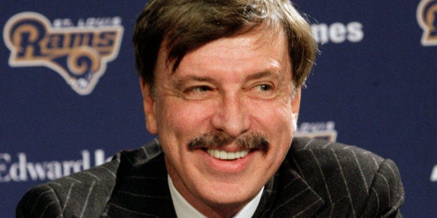 St. Louis Rams owner Stan Kroenke speaks during a news conference where Jeff Fisher was officially introduced as the new head football coach of the St. Louis Rams NFL team, in St. Louis, Tuesday, Jan. 16, 2012. (AP Photo/Tom Gannam)