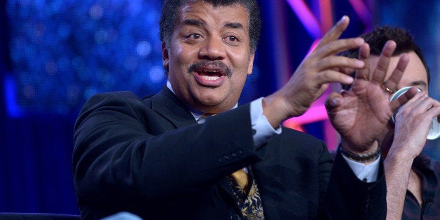 Host Neil DeGrasse Tyson is seen at the FOX Winter 2014 TCA, on Monday, Jan. 13, 2014, at the Langham Hotel in Pasadena, Calif. (Photo by Richard Shotwell/Invision/AP)