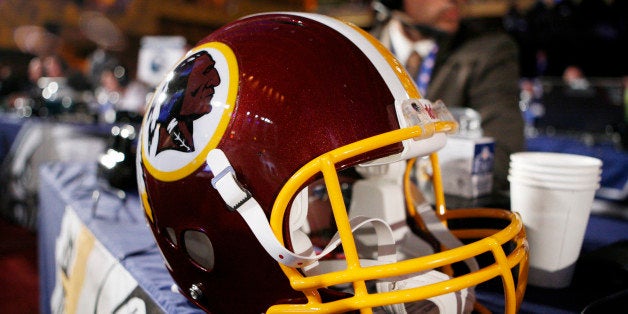 FILE - In this April 26, 2009 file photo, a Washington Redskins helmet is displayed during day two of...