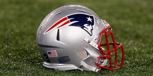 BALTIMORE, MD - SEPTEMBER 23: A New England Patriots helmet sits on the turf before the start of the Patriots game against the Baltimore Ravens at M&T Bank Stadium on September 23, 2012 in Baltimore, Maryland. (Photo by Rob Carr/Getty Images)