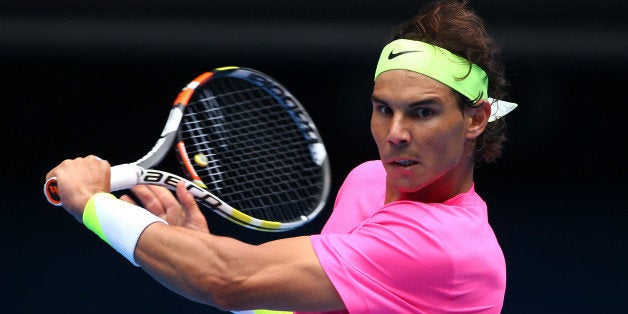 MELBOURNE, AUSTRALIA - JANUARY 27: Rafael Nadal of Spain plays a backhand in his quarterfinal match against Tomas Berdych of