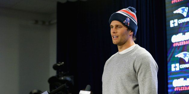 FOXBORO, MA - JANUARY 22: New England Patriots Quarterback Tom Brady talks to the media during a press conference to address the under inflation of footballs used in the AFC championship game at Gillette Stadium on January 22, 2015 in Foxboro, Massachusetts. (Photo by Maddie Meyer/Getty Images)